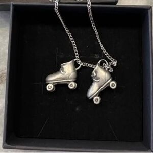 Sarah Coventry roller skate necklace